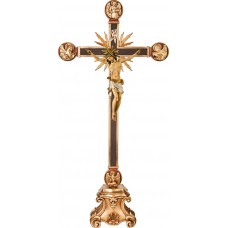 Corpus Pisa on cross with Evangelists and rays on pedestal
