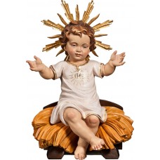 Niño Jesús vestido IHS sentado en cuna